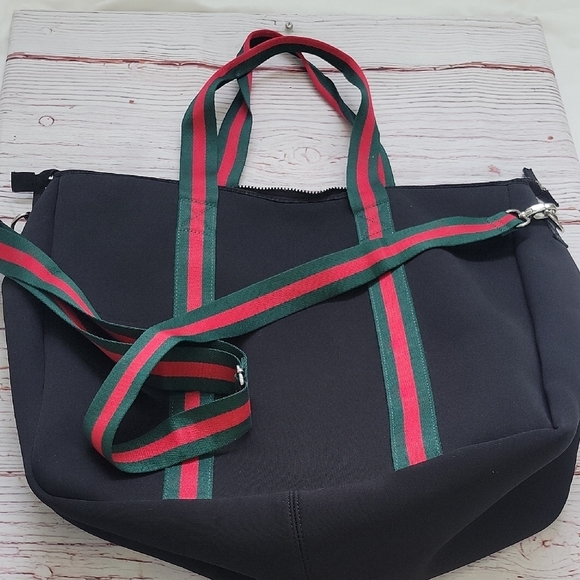 unbranded Handbags - Black and Red Travel Bag with Sporty Design